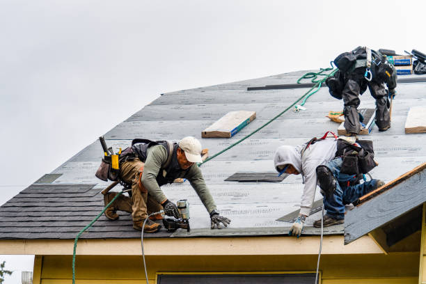 Professional Roofing technician working in Chase, PA